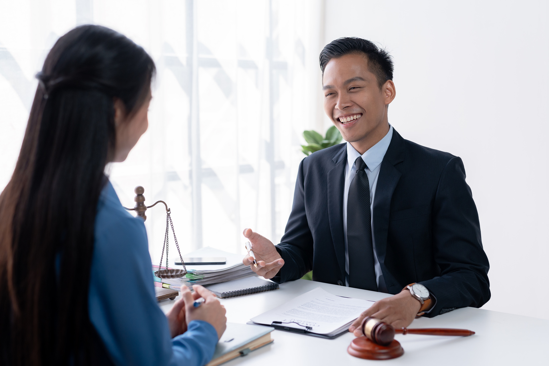 lawyer and client discussing at the table