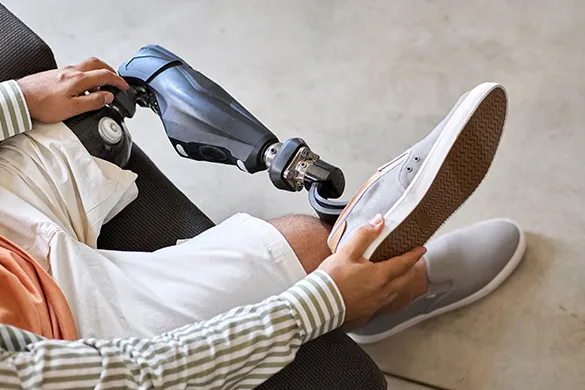 Person adjusting prosthetic leg