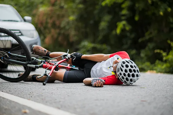 Cyclist injured by car on roadside