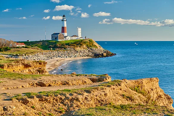 Lighthouse on rocky coastal point